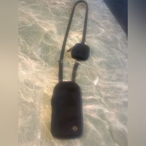 Lululemon small crossbody. Holds phone, keys, wallet, cash and credit cards